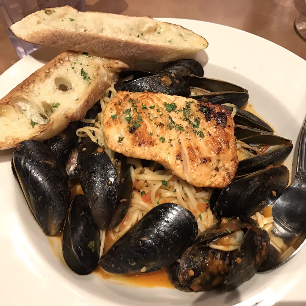 The Huntsman's Grill - Salmon and mussels over pasta. - American Near Me - Williamsburg, Virginia The Huntsman's Grill - Salmon and mussels over pasta. - American Near Me - Williamsburg, Virginia