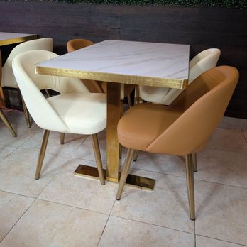 Dvine Mediterranean Experience - Long Beach - Table by the wall - Mediterranean Near Me - Long Beach, California