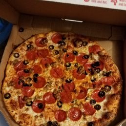 Brooklyn style thin crust with pepperoni, Italian sausage, and olives. Brooklyn style thin crust with pepperoni, Italian sausage, and olives.