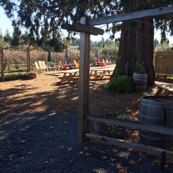 Furthermore Wines - Looking out at the bocce court and picnic area at Graton Ridge Cellars. - Wine Tasting Room Near Me - Sebastopol, California Furthermore Wines - Looking out at the bocce court and picnic area at Graton Ridge Cellars. - Wine Tasting Room Near Me - Sebastopol, California