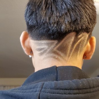 The Gentleman's Barber Shop - Back side angle of his barber Alec doin a freestyle design - Barbers Near Me - Roseville, California The Gentleman's Barber Shop - Back side angle of his barber Alec doin a freestyle design - Barbers Near Me - Roseville, California