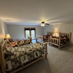 Riverside Rustics - Four twin log beds