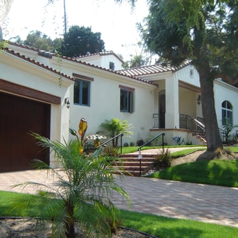 Loera Designs - a house with a large driveway - Interior Design Near Me - Redondo Beach, California