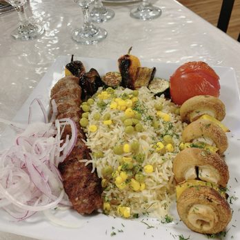 Mirage Mediterranean - a plate of food on a table - Mediterranean Near Me - Cincinnati, Ohio