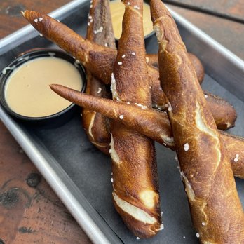 Aberrant Ales - Pretzels with beer cheese and mustard sauces (you get choice of 1 sauce and can add on another for up charge $) - Breweries Near Me - Howell, Michigan Aberrant Ales - Pretzels with beer cheese and mustard sauces (you get choice of 1 sauce and can add on another for up charge $) - Breweries Near Me - Howell, Michigan