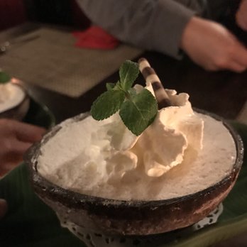 Na Siam - Coconut ice cream in a coconut shell - Thai Near Me - Amsterdam, New Hampshire Na Siam - Coconut ice cream in a coconut shell - Thai Near Me - Amsterdam, New Hampshire