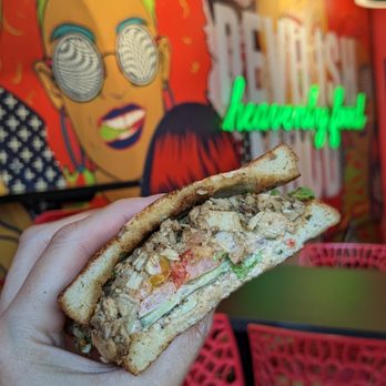 Holy Wiches - Holding half of my chickwich sandwich on sourdough - Sandwiches Near Me - Mississauga, Ontario