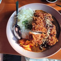 Katsu-curry set. Large quantity: we took some home with us. Curry taste was spot-on Japanese style. Katsu-curry set. Large quantity: we took some home with us. Curry taste was spot-on Japanese style.