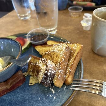 Tonic Kitchen+Bar - French toast with bacon, poached eggs and fruit - very good! - Bars Near Me - Calgary, Alberta