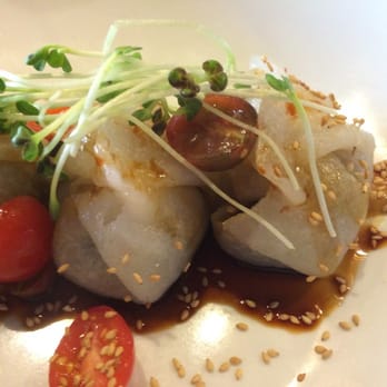 Lucky Belly - Oxtail dumplings, soy glaze, cherry tomatoes, hot mustard creme - Bars Near Me - Honolulu, Hawaii