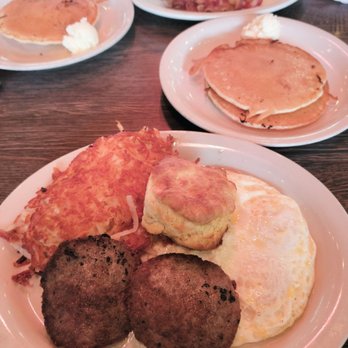 Metro Diner - The Bissell Breakfast with hashbrowns, 2 eggs over easy 2 sausage patties, biscuit, 2 pancakes, and coffee (not shown) - American Near Me - Tampa, Florida Metro Diner - The Bissell Breakfast with hashbrowns, 2 eggs over easy 2 sausage patties, biscuit, 2 pancakes, and coffee (not shown) - American Near Me - Tampa, Florida