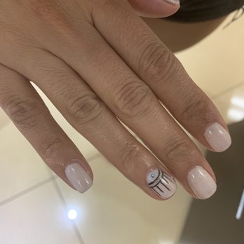 Noire nails & spa - Gel mani w evil eye design - Nail Salons Near Me - Hialeah, Florida