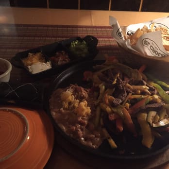 El Cholo - Steak Fajitas.. The cold stuff comes separated from the sizzling Fajitas for a better experience - Mexican Near Me - Los Angeles, California El Cholo - Steak Fajitas.. The cold stuff comes separated from the sizzling Fajitas for a better experience - Mexican Near Me - Los Angeles, California