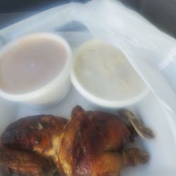 Pollos A La Brasas - 1/2 chicken with 2 sides.