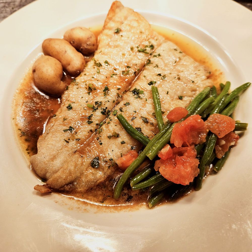 The Annapolitan - Sole Meuniere, sautéed in a lemon butter sauce. Side of boiled potato and green bean. - Breakfast & Brunch Near Me - North Augusta, South Carolina The Annapolitan - Sole Meuniere, sautéed in a lemon butter sauce. Side of boiled potato and green bean. - Breakfast & Brunch Near Me - North Augusta, South Carolina