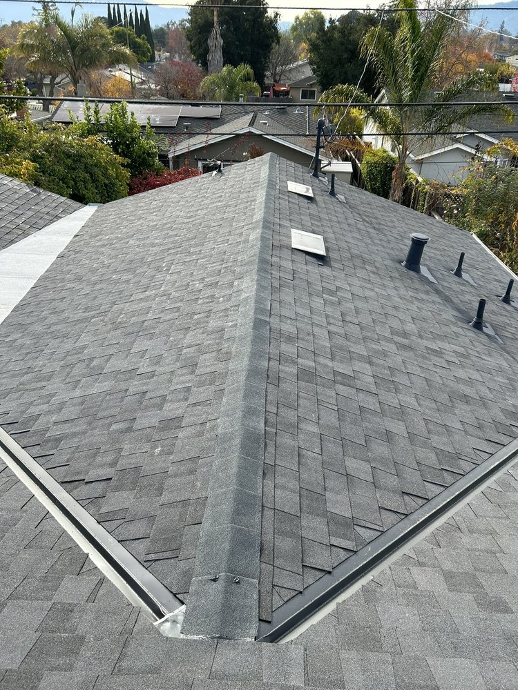 Slide of Tip Top Roofing