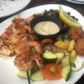 Pompano Joe's - Grilled shrimp, grilled mahi mahi, mixed veggies, and black beans and rice. So good and full of flavor! - Seafood Near Me - Destin, Florida