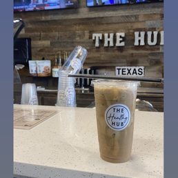 a cup of coffee on a counter