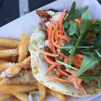 Roaming Fork - Salmon burrito "bowl" with truffle fries. - Street Vendors Near Me