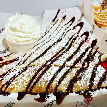 Crepes Bonaparte - CookieBerryAna crepe - absolutely amazing Biscoff cookie butter, whipped cream, chocolate drizzle, bananas, and strawberries ($9) - Desserts Near Me - Fullerton, California