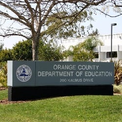 This signals the entrance to the Orange County Department of Education.