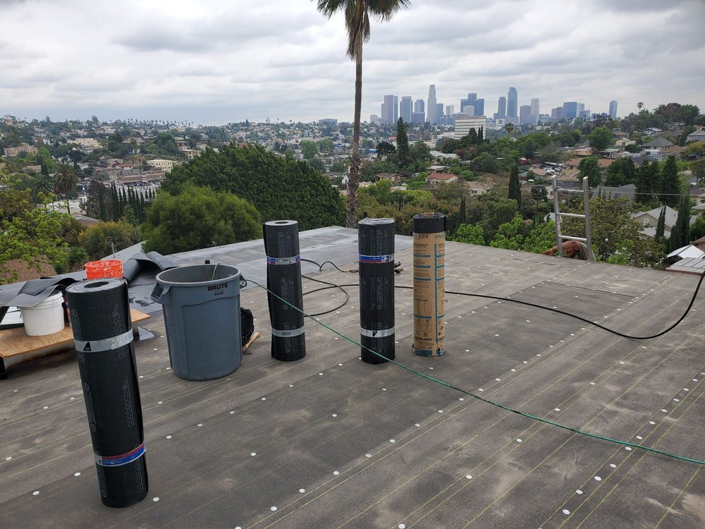 Slide of Trujano Roofing