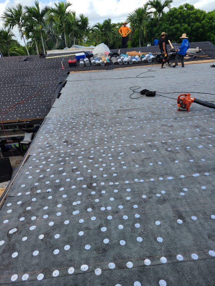 Slide of D-Tech Roofing