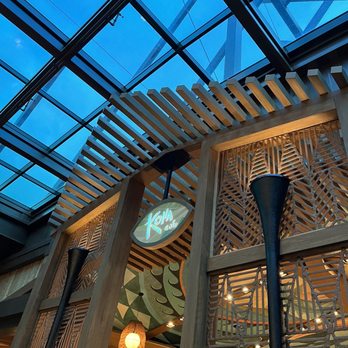 Kona Cafe - a clock on the outside of the building - Sushi Bars Near Me - Lake Buena Vista, Florida