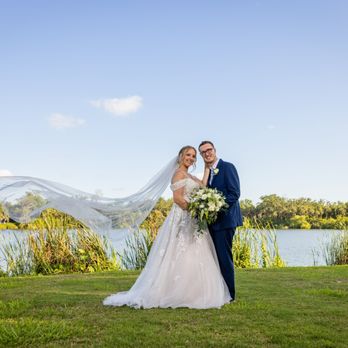 Worthington for Events - Beautiful shot of the couple by the water. - Venues & Event Spaces Near Me - Ellenton, Florida Worthington for Events - Beautiful shot of the couple by the water. - Venues & Event Spaces Near Me - Ellenton, Florida