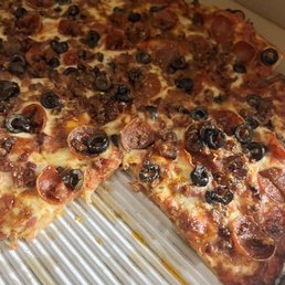 Large pizza doesn't look large, but it packs a lot. Large pizza doesn't look large, but it packs a lot.