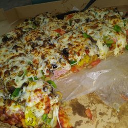 Scottown Montys Pizza & Mini Mart - 18 inch deluxe with all the toppings. Makes me weak in the knees seeing. DELICIOUS