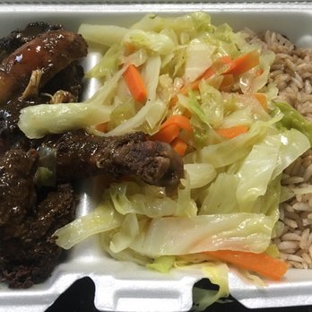 Sweet Spice - Jerk chicken (deliciously spicy), rice & peas, and carrots & cabbage - Caribbean Near Me - Savannah, Georgia Sweet Spice - Jerk chicken (deliciously spicy), rice & peas, and carrots & cabbage - Caribbean Near Me - Savannah, Georgia