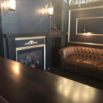 Rhow Coffee - Lovely couch and fireplace! - Coffee & Tea Near Me - Massillon, Ohio