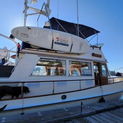 Soundview Sunset Cruises - The boat has seating on top, at the front, and indoors