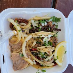 Homies Tacos - Three tacos. Suadero, Cabeza, and Chorizo.