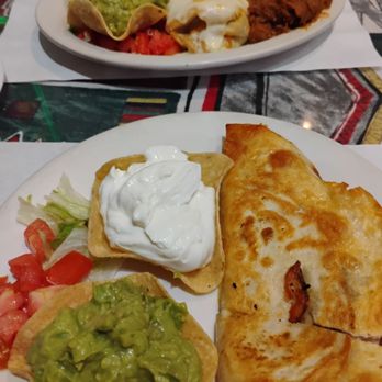 Poncho & Cisco - Top: beef chimichanga dinner, bottom: grilled chicken quesadilla dinner - Mexican Near Me - Harrison Township, Michigan Poncho & Cisco - Top: beef chimichanga dinner, bottom: grilled chicken quesadilla dinner - Mexican Near Me - Harrison Township, Michigan