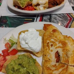 Top: beef chimichanga dinner, bottom: grilled chicken quesadilla dinner