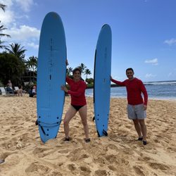 Hoku Water Sports - Joe and Sarah Rose surfing