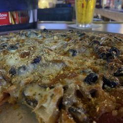 Whiskey Dick’s Bar & Grill - Italian sausage, black olive, mushrooms