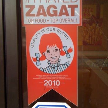 Wendy's - a sign in the window of a restaurant - Burgers Near Me - Fort Pierce, Florida Wendy's - a sign in the window of a restaurant - Burgers Near Me - Fort Pierce, Florida
