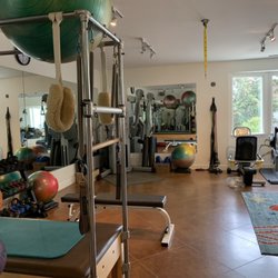 Beach Club Athletics - Stretch table free motion cable machine, etc