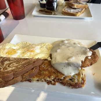 Zoe Coffee & Kitchen - Chicken-Fried Steak & Eggs and Lazy Susan Combo in the back - Coffee & Tea Near Me - Pullman, Washington Zoe Coffee & Kitchen - Chicken-Fried Steak & Eggs and Lazy Susan Combo in the back - Coffee & Tea Near Me - Pullman, Washington