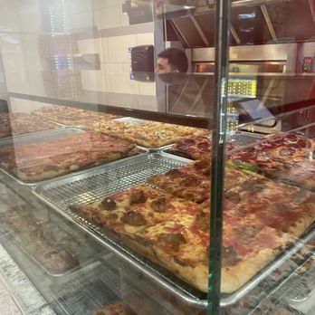 The Slice Shop - display pizzas - Pizza Near Me - Chicago, Illinois