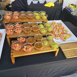 Cocktail hour with chips for ceviche, salsa, and Guacamole! Plus little cups of fruit with tajin, salt and all the fixings!
