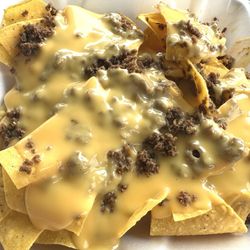 Taco Delite - 2026 Meat & Cheese Nacho Hit the spot! No cheese skimping!