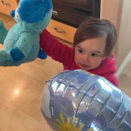Abby with her new puppy & balloon!!