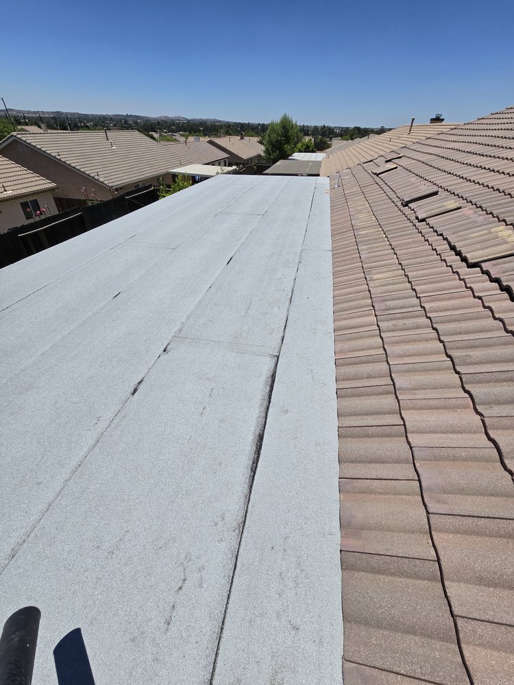 Slide of Eminent Roofing