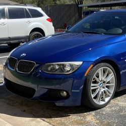 Twomey Auto Works - Hood repainted, new headlight & modules, reattach spoiler. 2/24