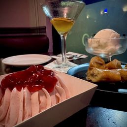 Desserts banana roll with coconut ice cream. Strawberry lava cake. Desserts banana roll with coconut ice cream. Strawberry lava cake.