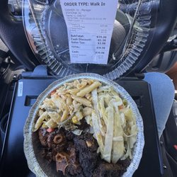 Caribbean Spot - Large plate cost me $36.98 requested they fill the plate up some of the workers had something to say.